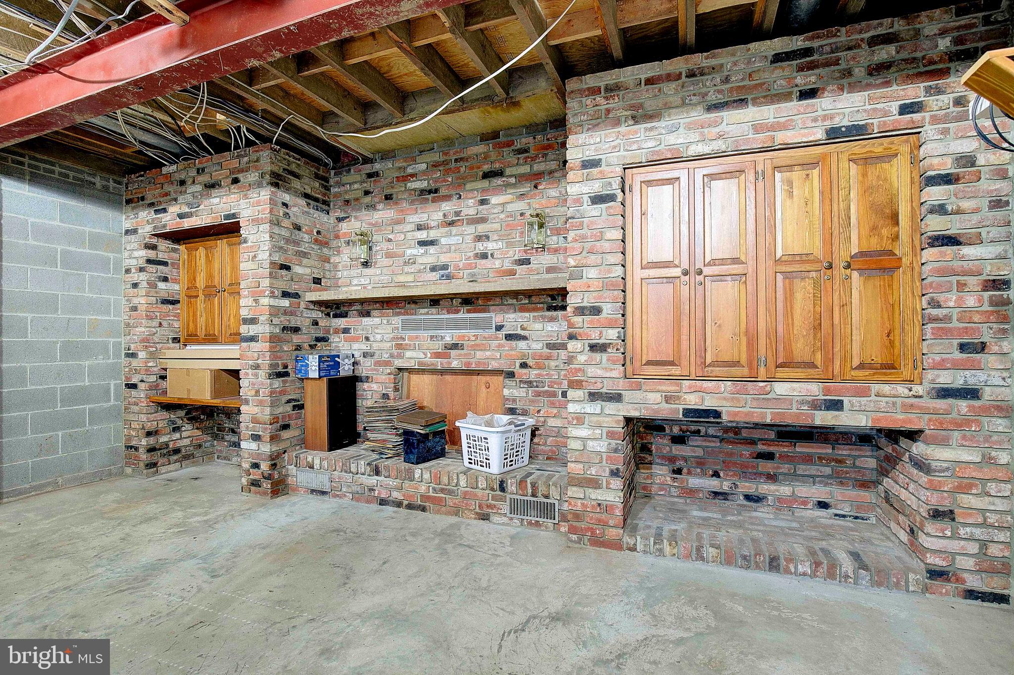 23369 Colton Point Road Avenue, MD 20609 - Photo 36 of 53 Basement fireplace