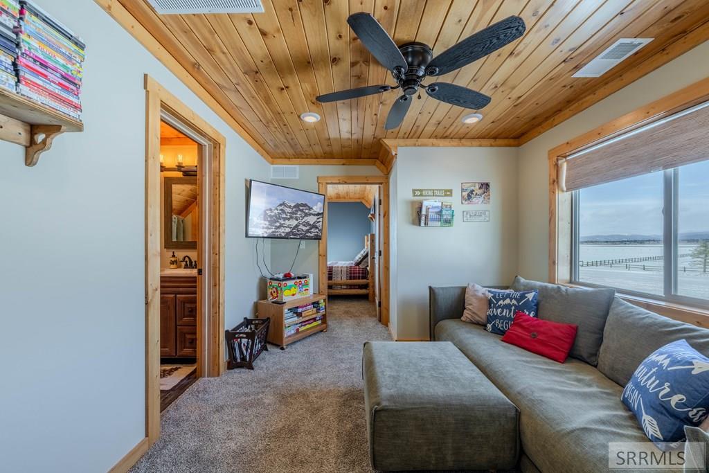 4099 Stagecoach Way Island Park, ID 83429 - Photo 41 of 66 Upstairs apartment living room area