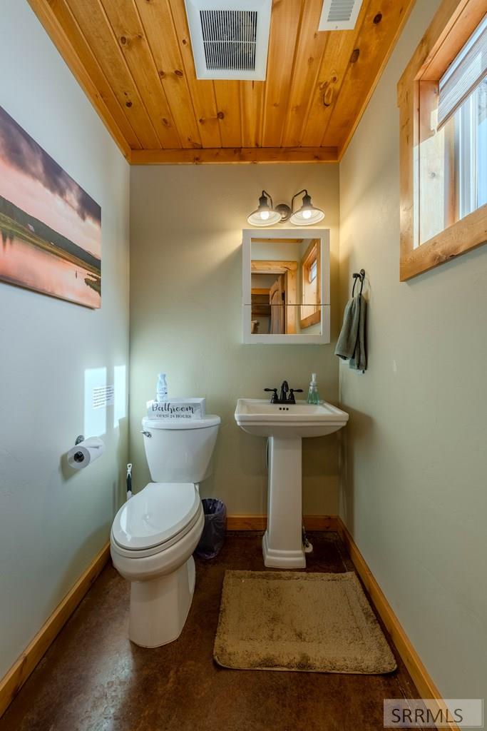 4099 Stagecoach Way Island Park, ID 83429 - Photo 45 of 66 1/2 bath apartment side