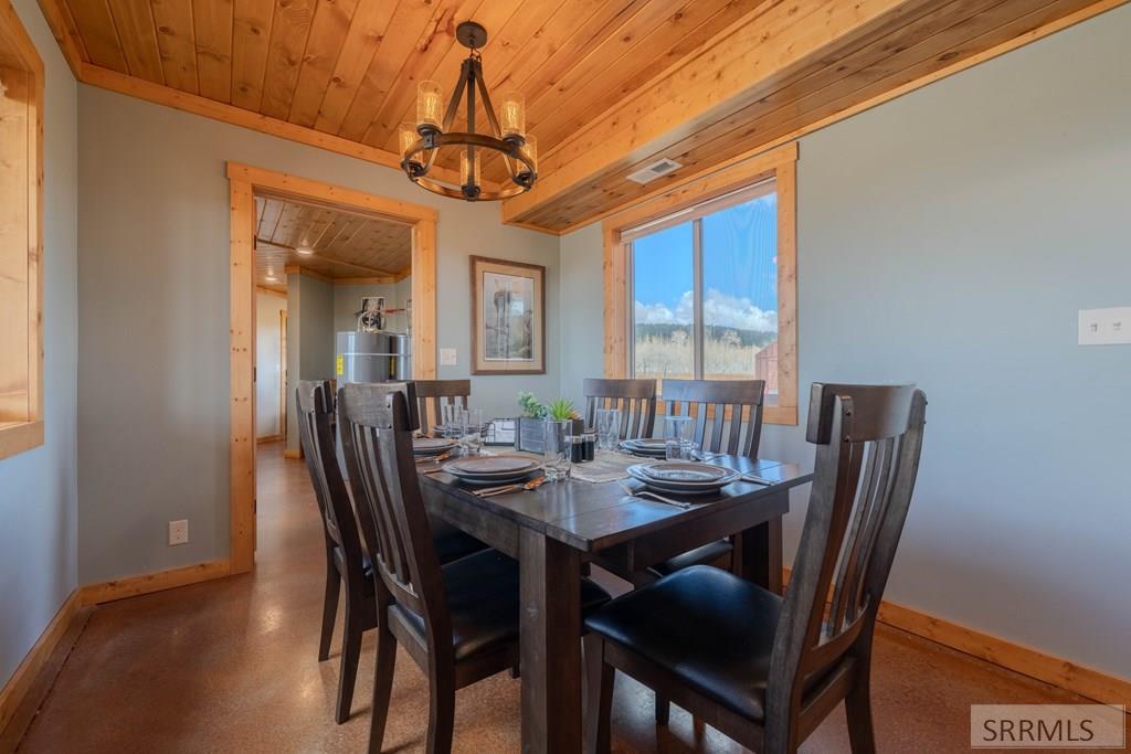 4099 Stagecoach Way Island Park, ID 83429 - Photo 9 of 66 Main Cabin Dining area