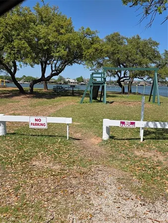 a view of a park with welcome board