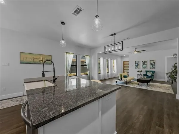 a view of a kitchen and living room