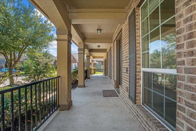 a view of a hallway with windows