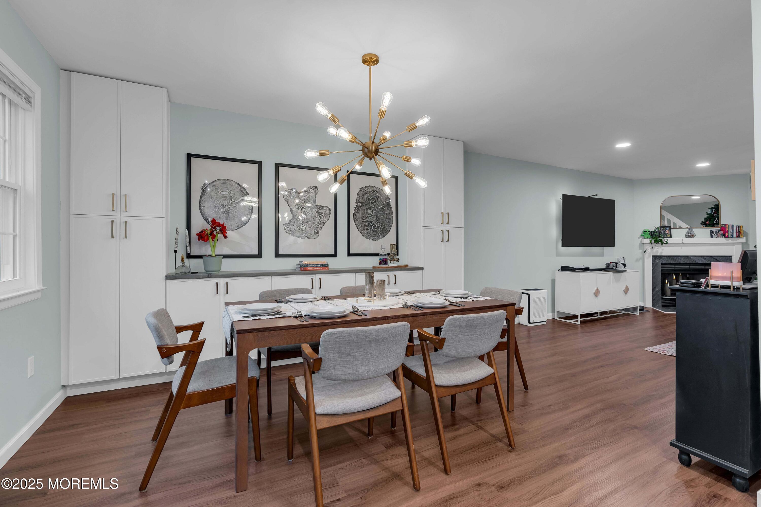 13 Dutch Lane Hazlet, NJ 07730 - Photo 12 of 28 a view of a dining room with furniture and wooden floor