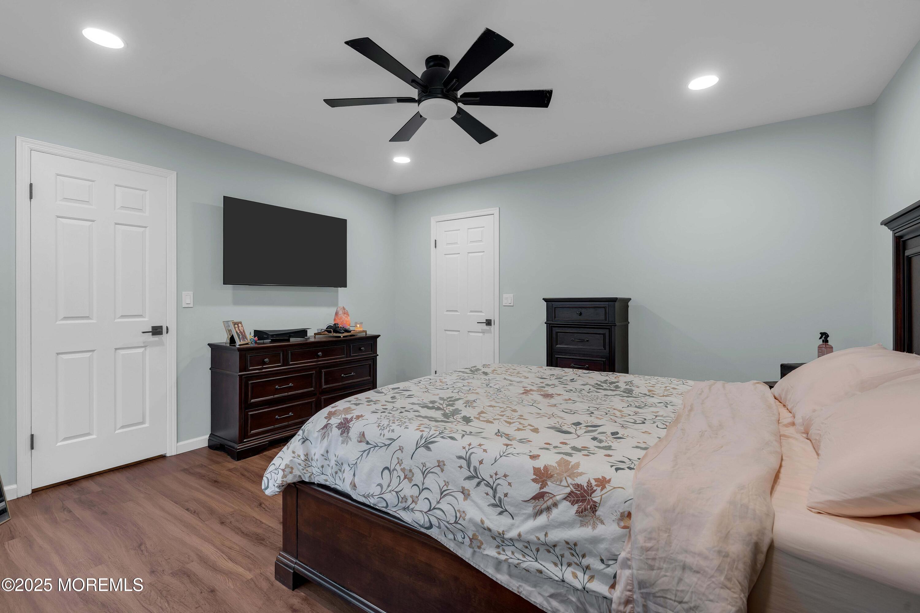 13 Dutch Lane Hazlet, NJ 07730 - Photo 21 of 28 a bedroom with a bed and a flat screen tv