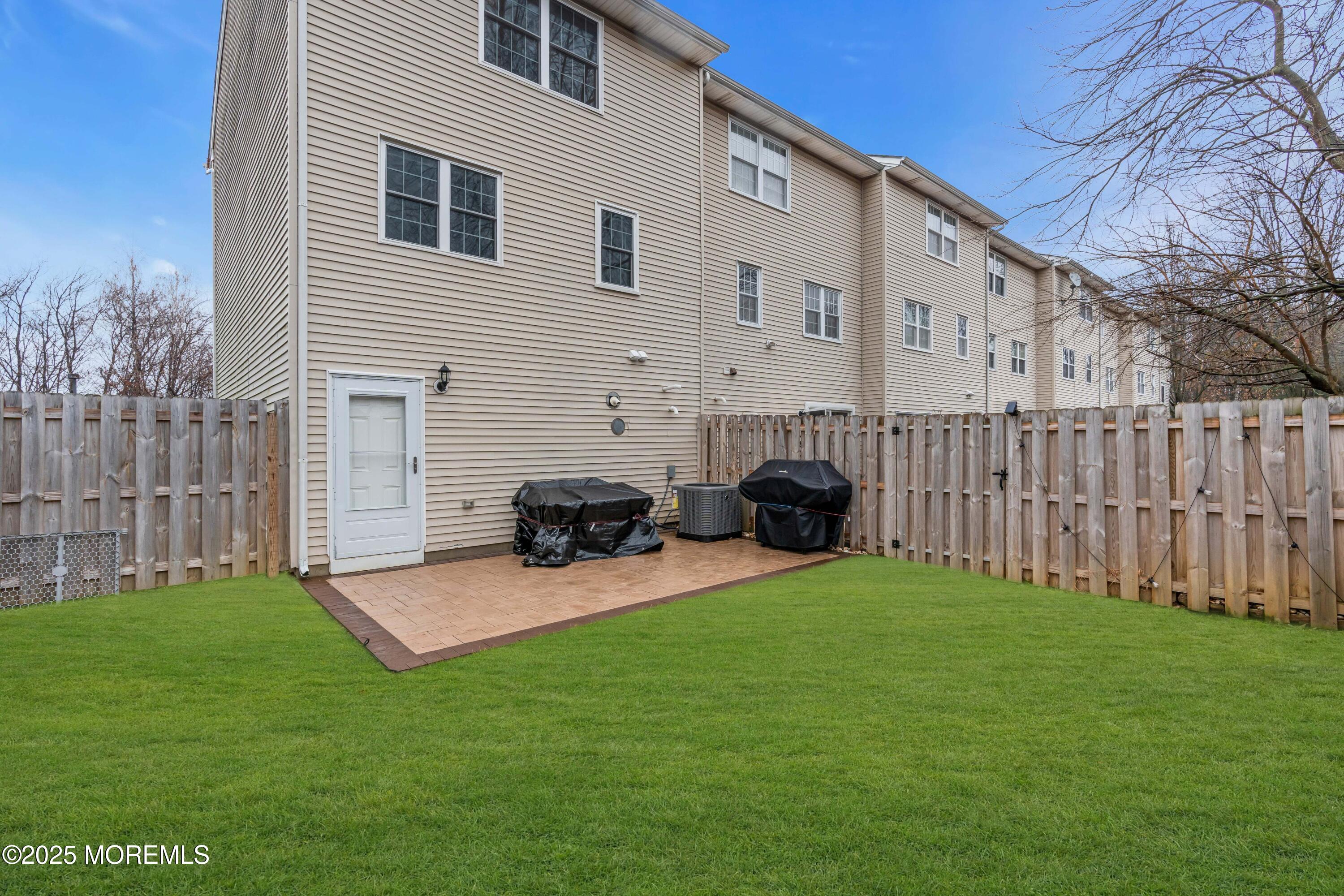 13 Dutch Lane Hazlet, NJ 07730 - Photo 26 of 28 a view of a house with backyard and a chair