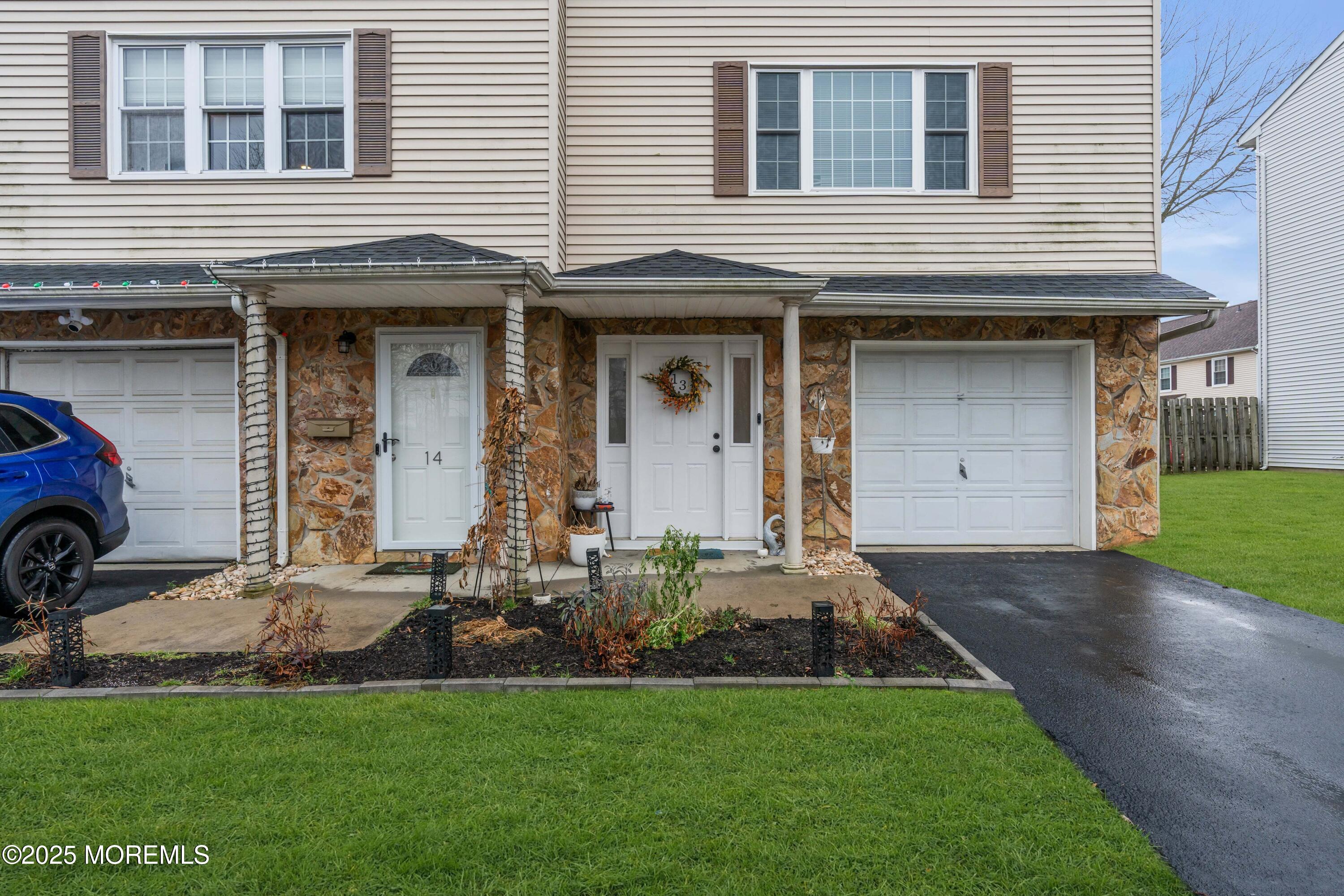13 Dutch Lane Hazlet, NJ 07730 - Photo 3 of 28 a front view of a house with a yard