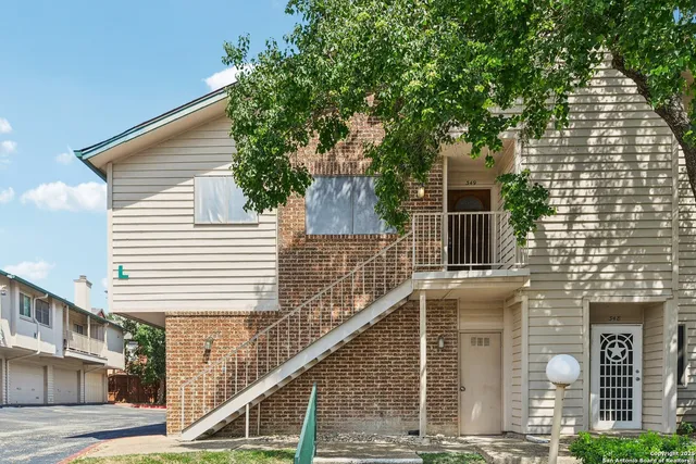 a front view of a house with street
