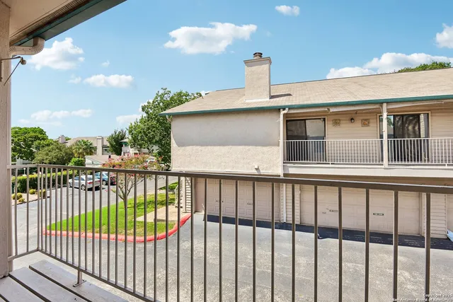 a view of a houses with a balcony