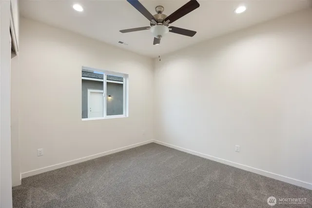 a view of a yard with a house