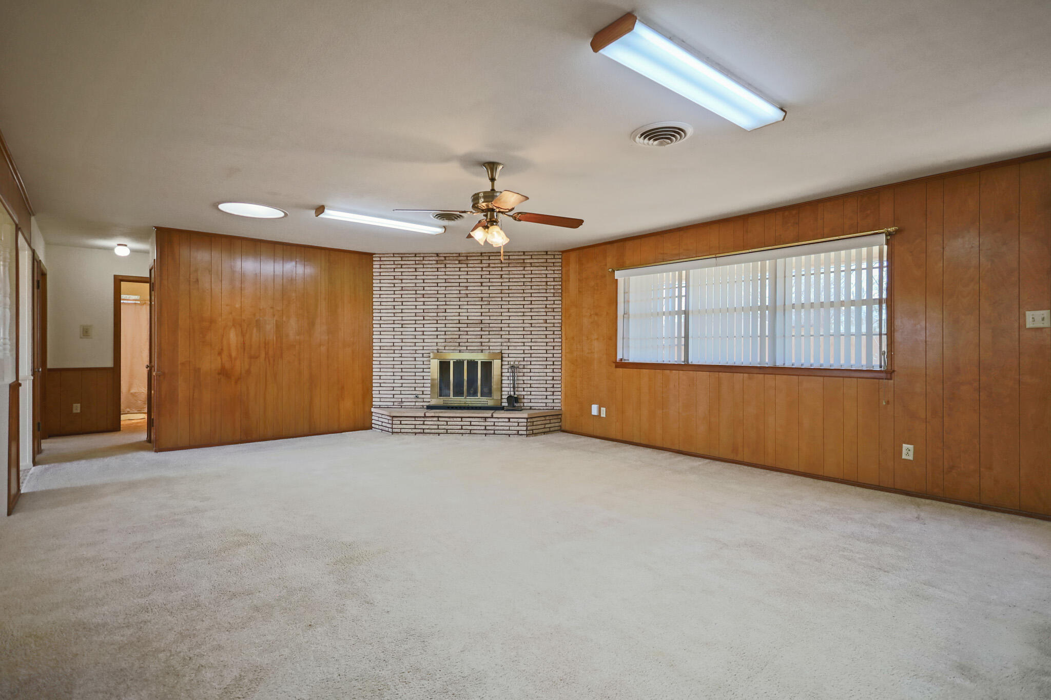 5517 26th Street Lubbock, TX 79407 - Photo 11 of 55 a view of an empty room with a window