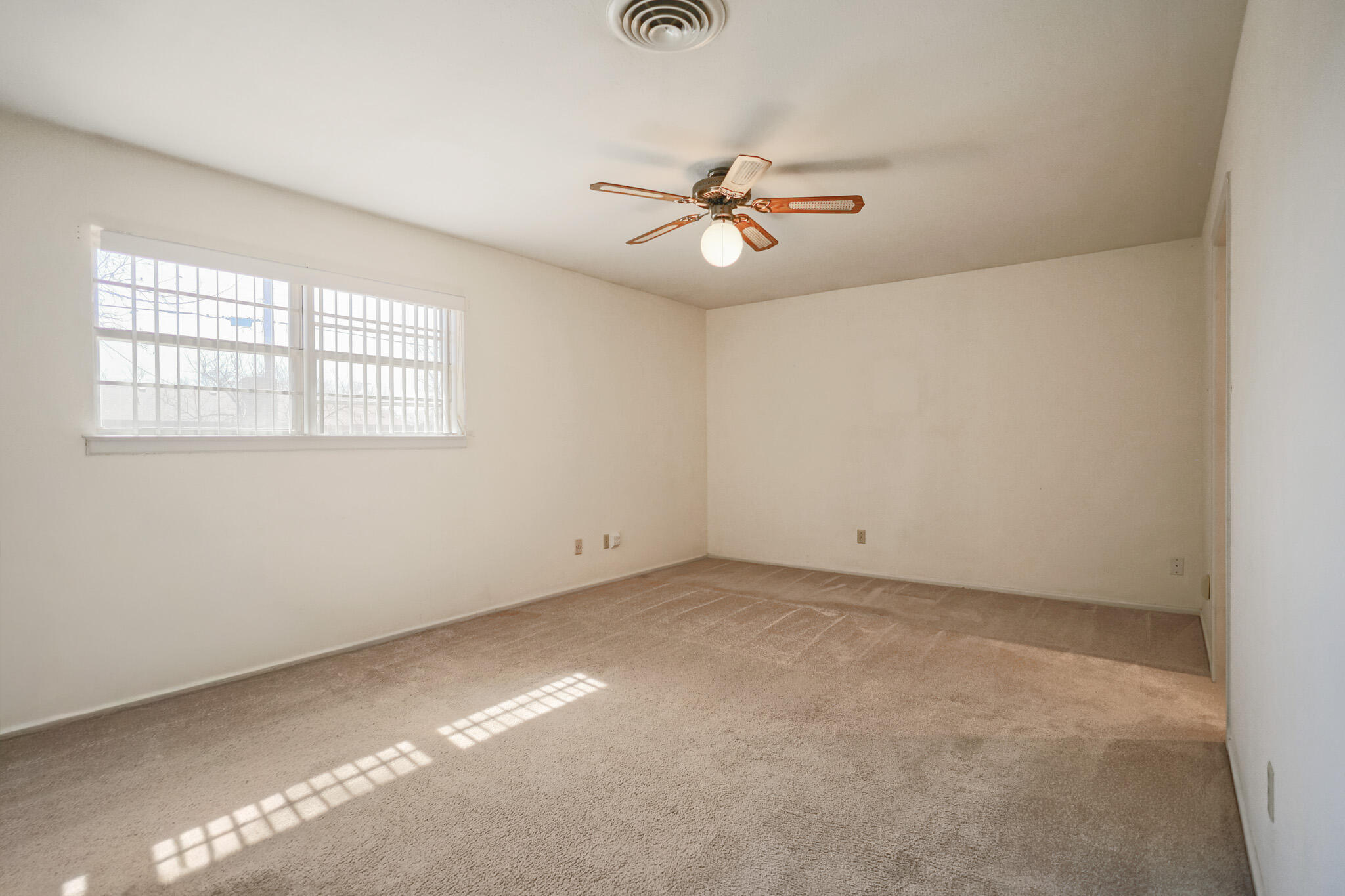 5517 26th Street Lubbock, TX 79407 - Photo 28 of 55 a view of an empty room with a window