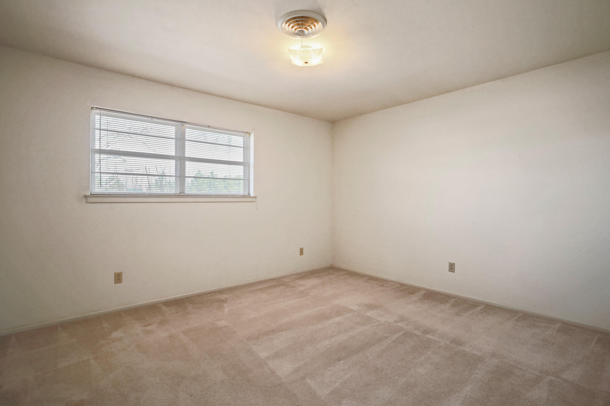 5517 26th Street Lubbock, TX 79407 - Photo 39 of 55 an empty room with a window