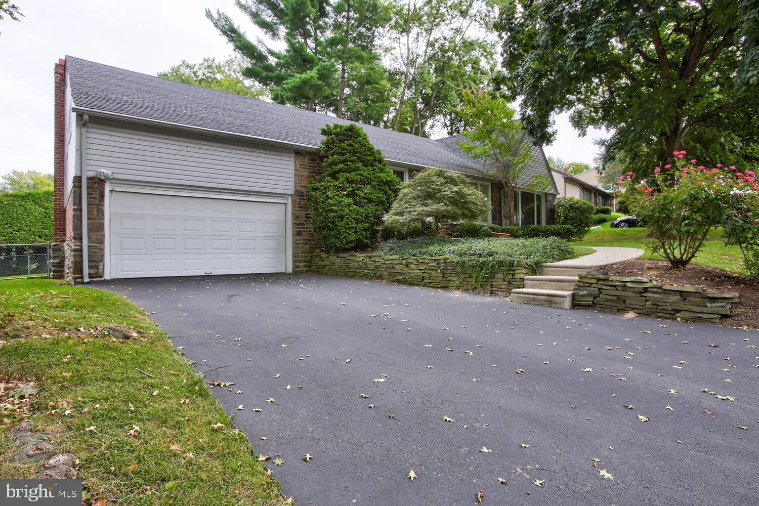 Two-car garage and plenty of driveway parking.