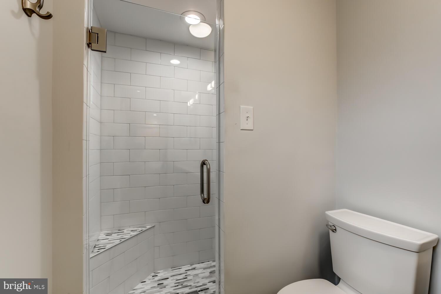 341 Glen Ridge Road Havertown, PA 19083 - Photo 19 of 31 Beautifully tiled stall shower & bench in Master.