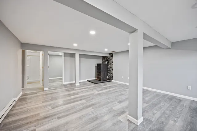 a view of a livingroom with wooden floor
