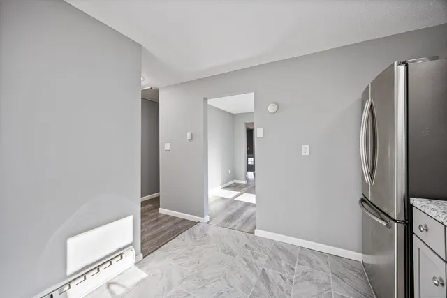 a bathroom with a sink and a large mirror