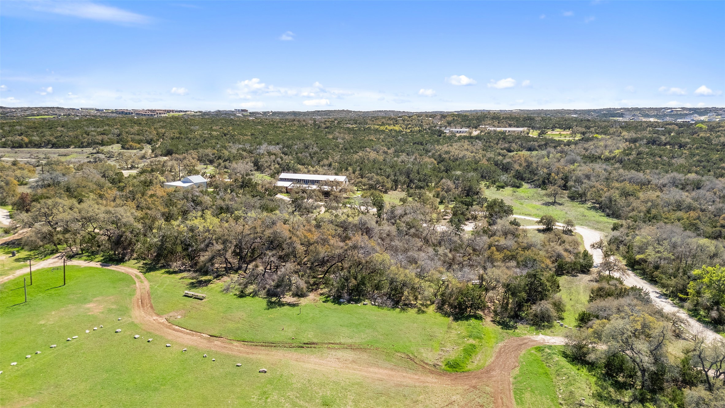 13005 D Fitzhugh Road Austin, TX 78736 - Photo 8 of 15 an aerial view of residential houses with outdoor space