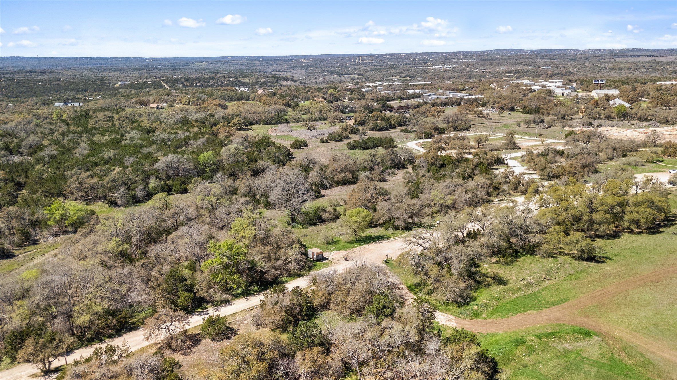 13005 D Fitzhugh Road Austin, TX 78736 - Photo 10 of 15 an aerial view of residential houses with city and green space