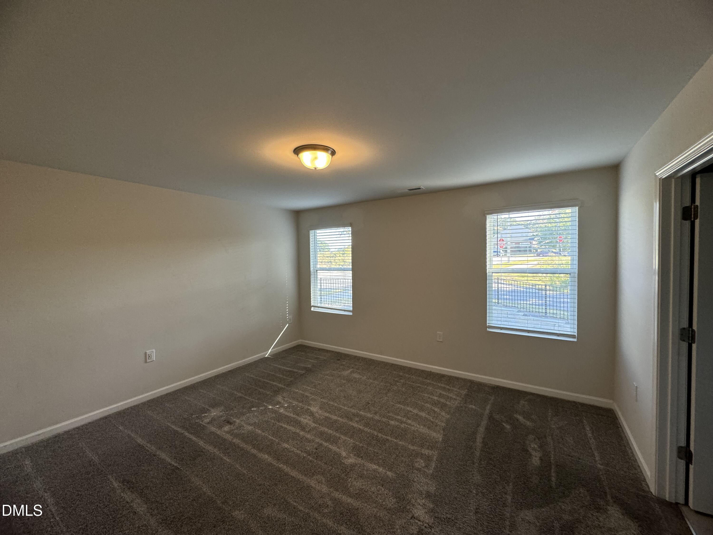 442 Sustainable Way Raleigh, NC 27610 - Photo 5 of 12 a view of an empty room and window