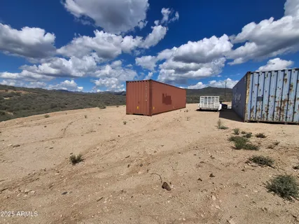 an aerial view of house with yard