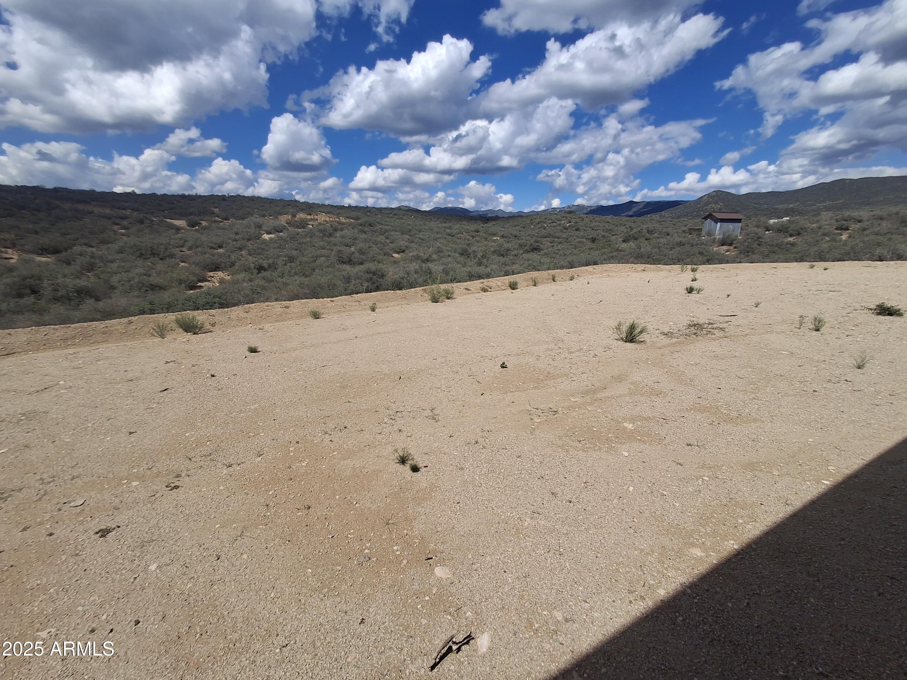 8020 West Framingham Road, Unit 228 Kirkland, AZ 86332 - Photo 16 of 18 a view of yard with ocean