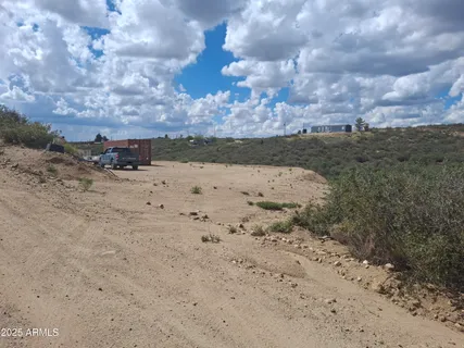 a view of a lake from a yard