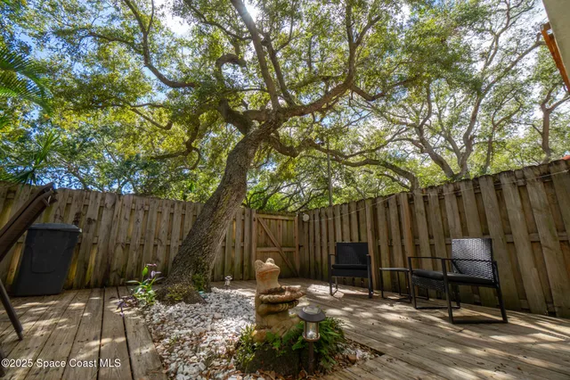 a view of a room with potted plants