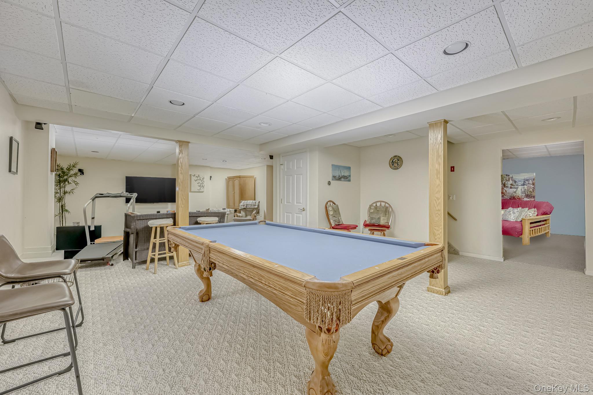 6 Wedge Way Suffern, NY 10901 - Photo 18 of 27 a living room with furniture and flat screen tv