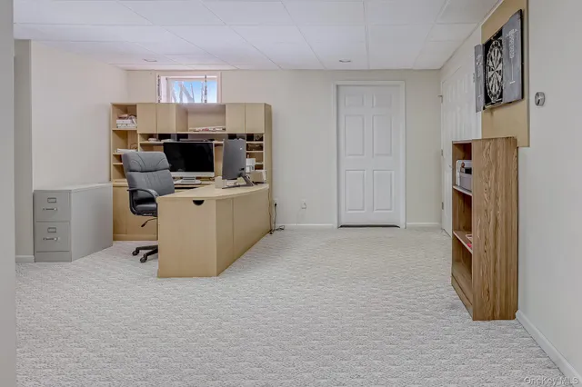 a view of kitchen with refrigerator stove and microwave