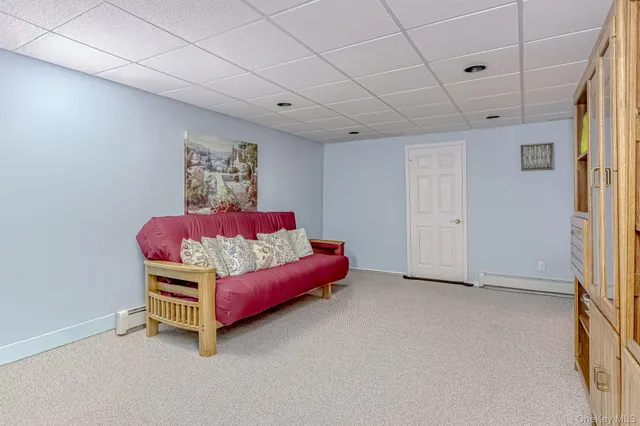 a room with a bed and a chair