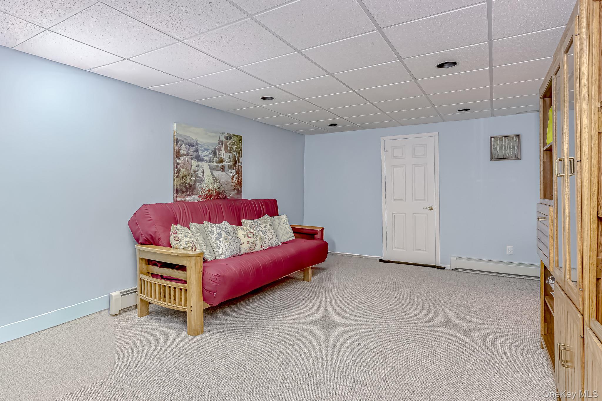 6 Wedge Way Suffern, NY 10901 - Photo 21 of 27 a room with a bed and a chair