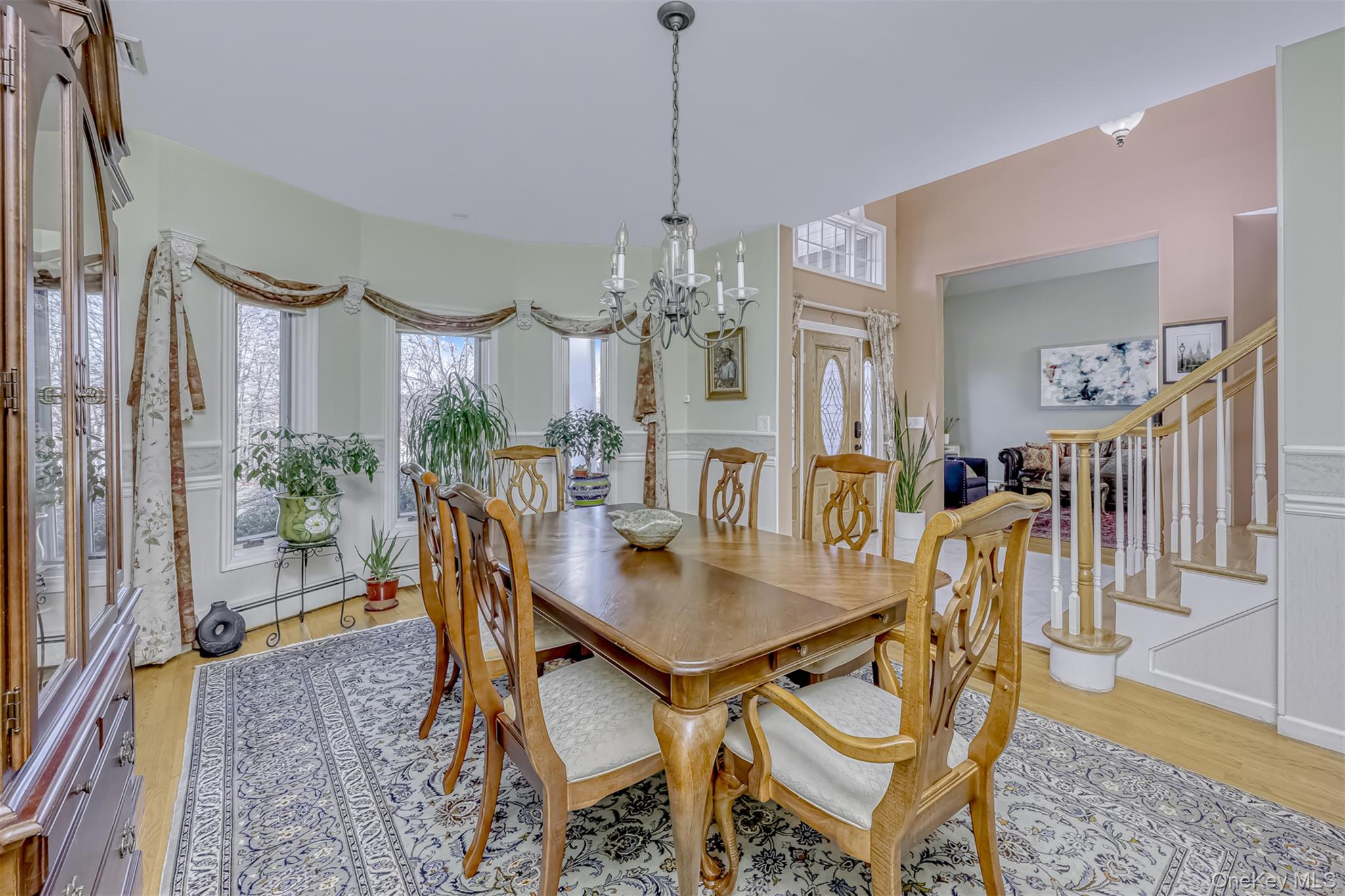 6 Wedge Way Suffern, NY 10901 - Photo 5 of 27 a view of a dining room with furniture and chandelier