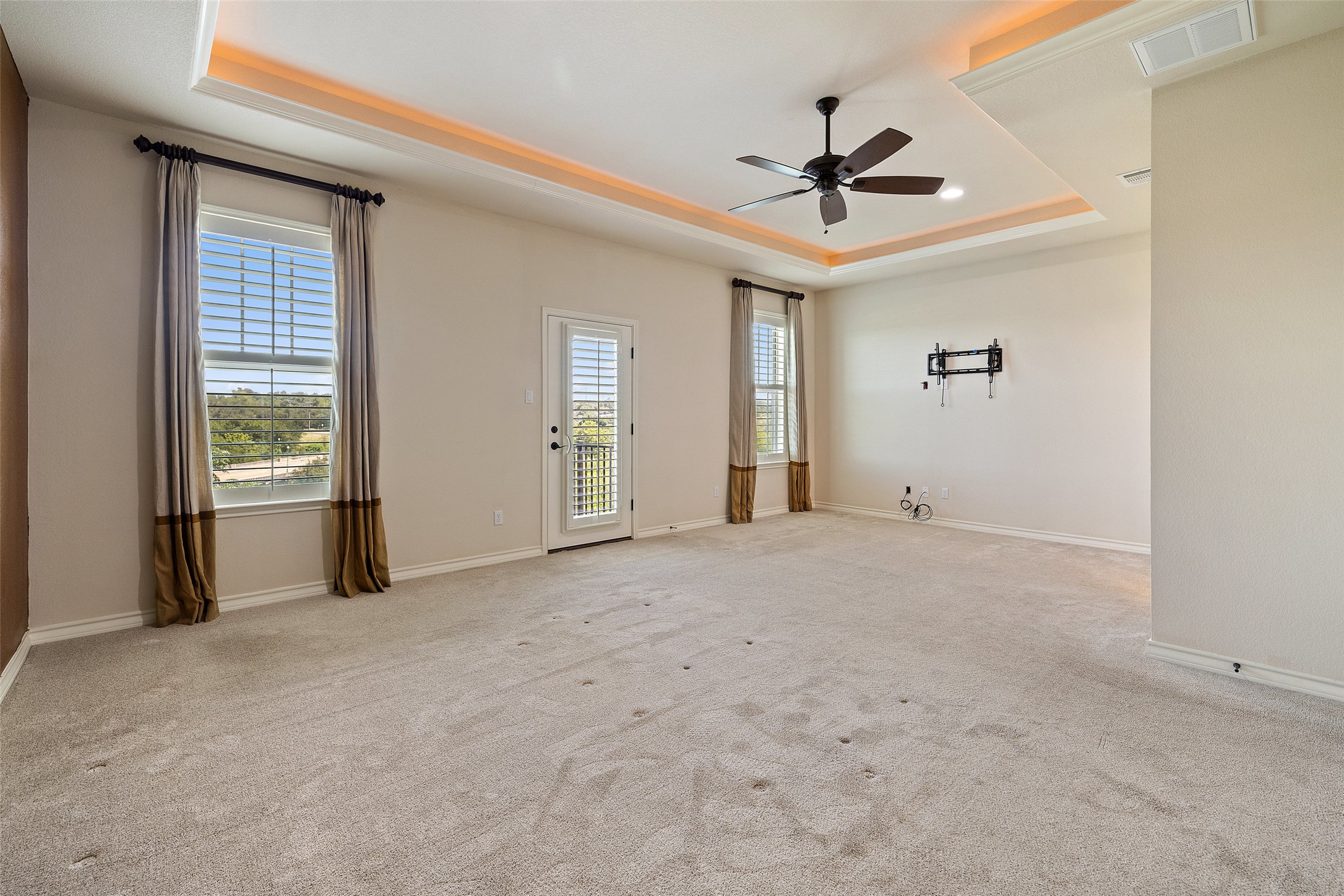 233 Adams Street Georgetown, TX 78628 - Photo 13 of 37 a view of a livingroom with a ceiling fan and window
