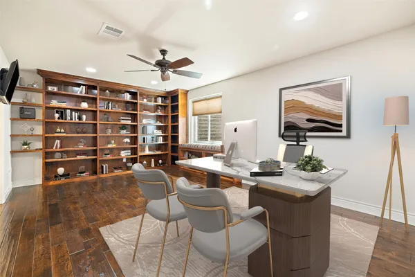 a dining room with a table and chairs