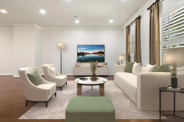 a living room with furniture a rug and a large window