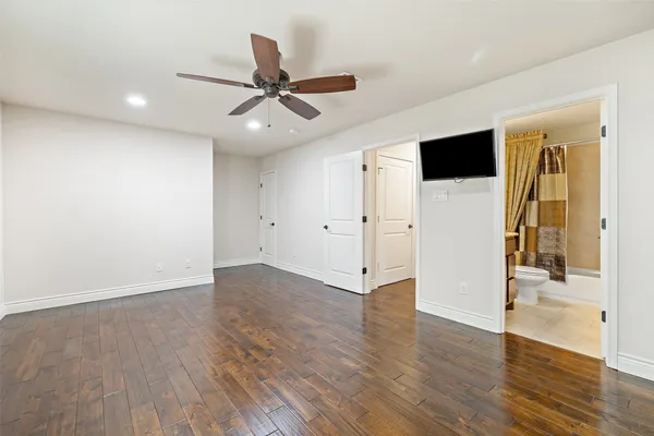 a view of a livingroom with wooden floor