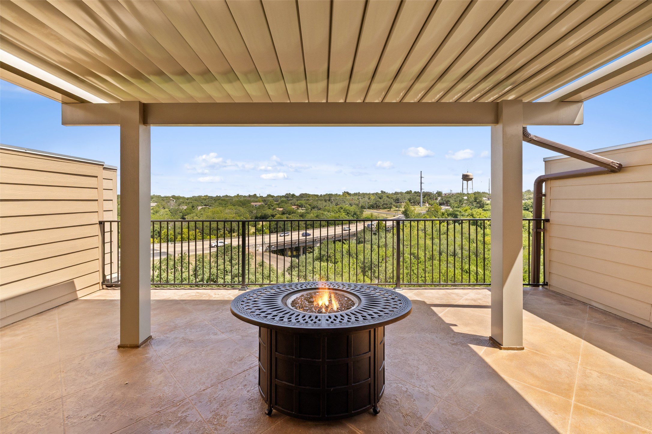 233 Adams Street Georgetown, TX 78628 - Photo 30 of 37 a view of a balcony with floor to ceiling window and stairs
