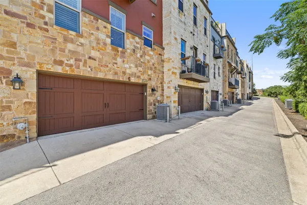 a view of a building with a street