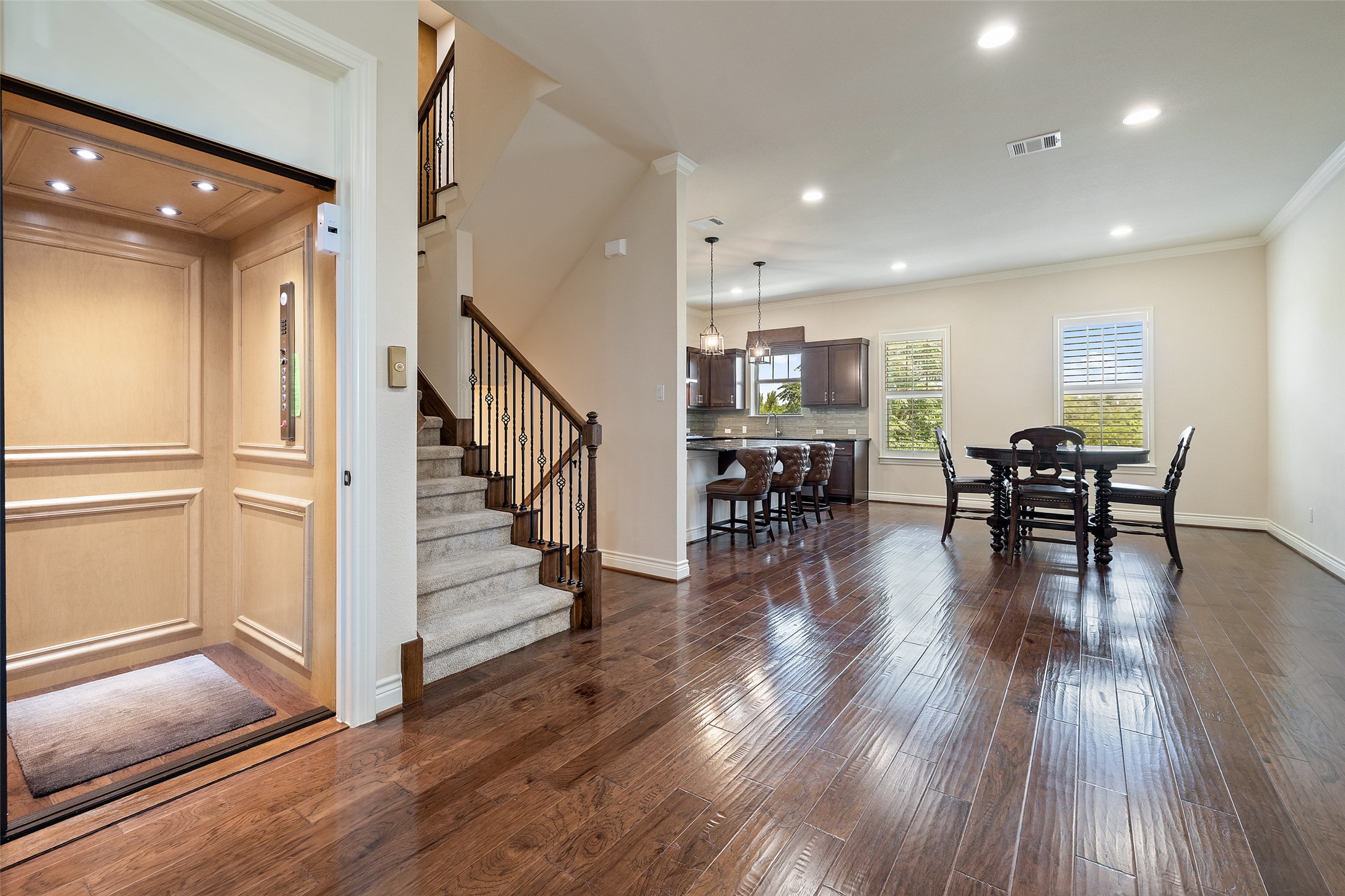 233 Adams Street Georgetown, TX 78628 - Photo 5 of 37 a view of dining room with furniture wooden floor and windows