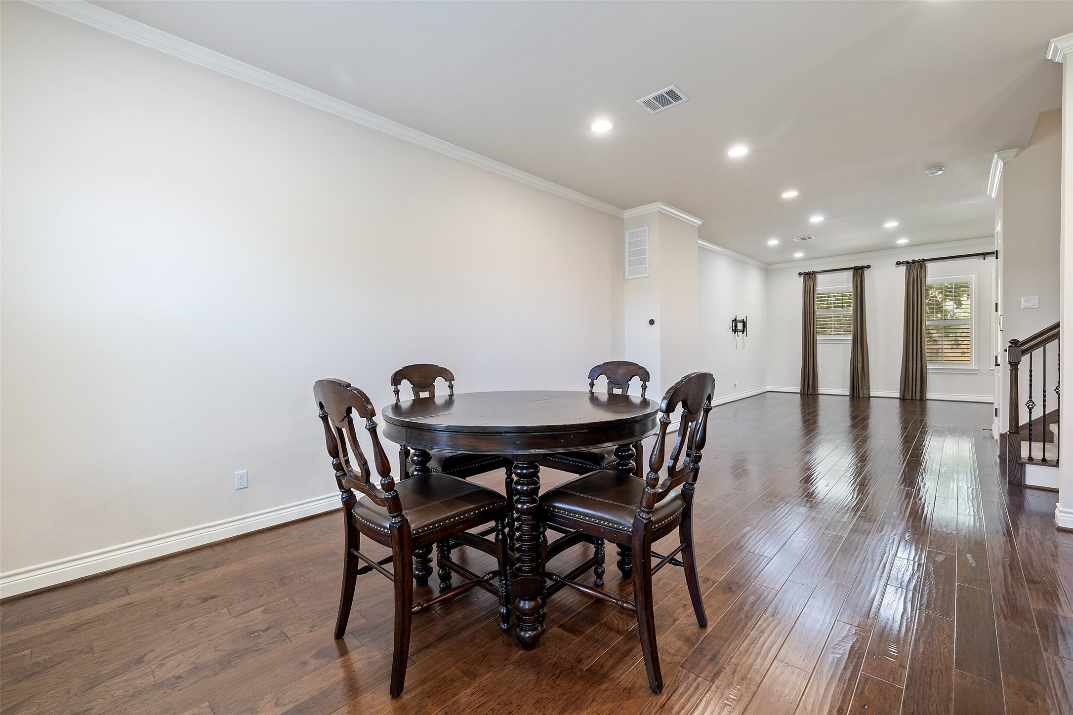 233 Adams Street Georgetown, TX 78628 - Photo 7 of 37 a view of a dining room with furniture and wooden floor