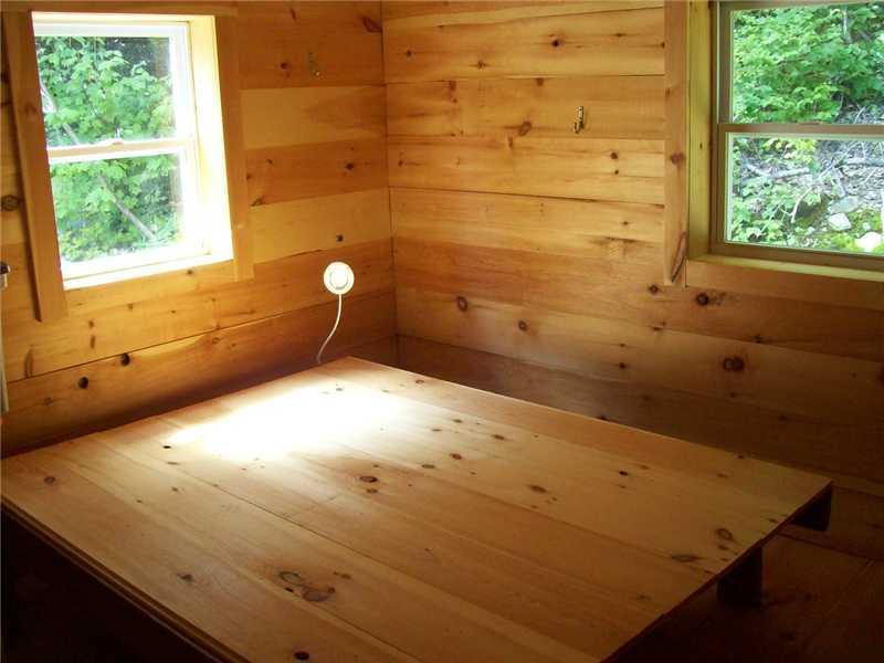 2 Camp Road Stratton, ME 04982 - Photo 13 of 18 Bedroom. Downstairs bedroom with...