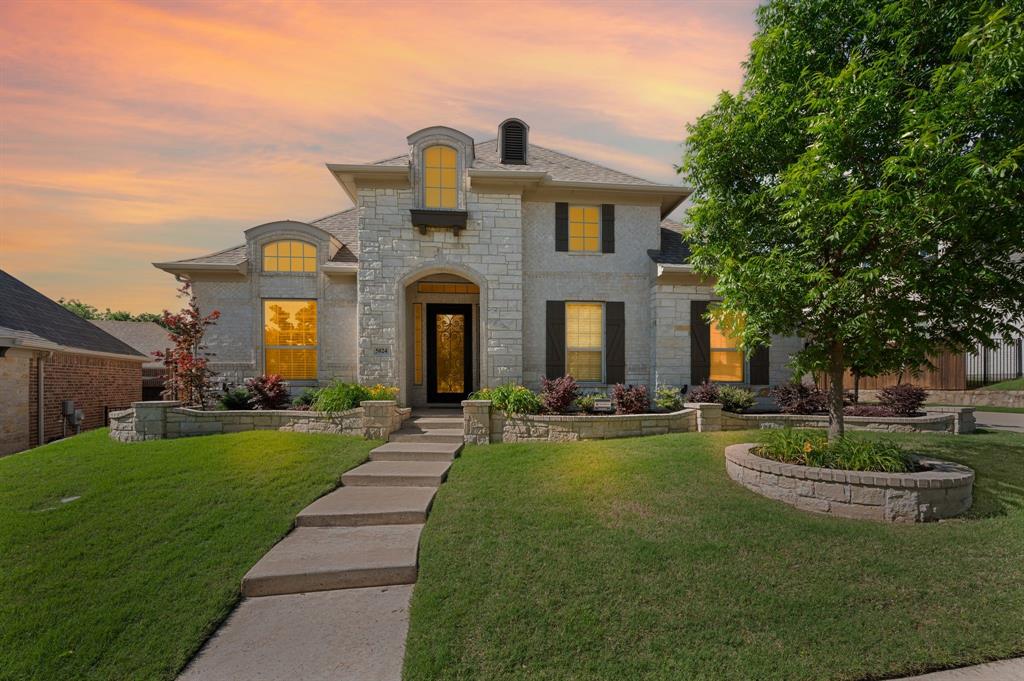 a front view of a house with swimming pool having outdoor seating