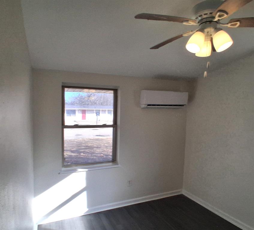 516 Forrest Lane Denison, TX 75021 - Photo 11 of 16 a bathroom with a window