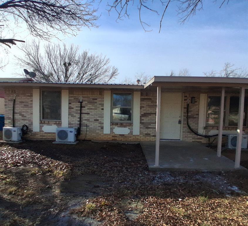 516 Forrest Lane Denison, TX 75021 - Photo 2 of 16 a front view of a house