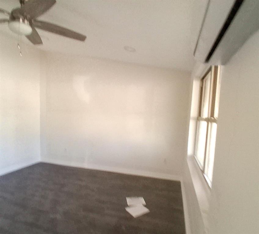 516 Forrest Lane Denison, TX 75021 - Photo 8 of 16 an empty room with windows