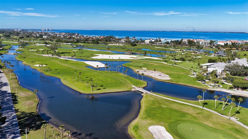 225 Sands Point Road, Unit 6201 Longboat Key, FL 34228 - Photo 29 of 30 a view of a swimming pool with a lake view and mountain view