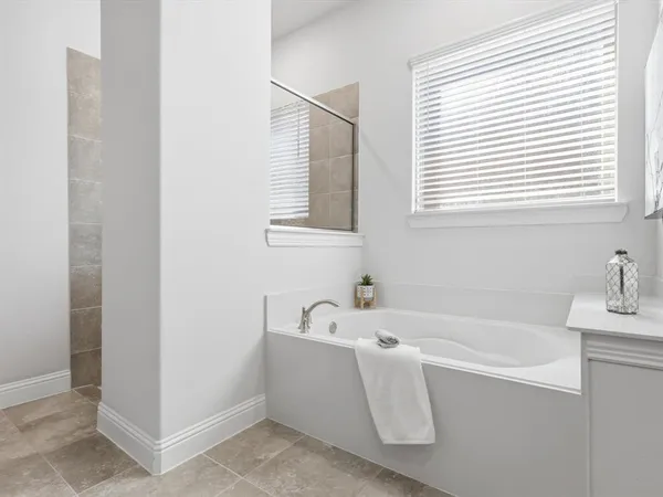 a bathroom with sink and bathtub