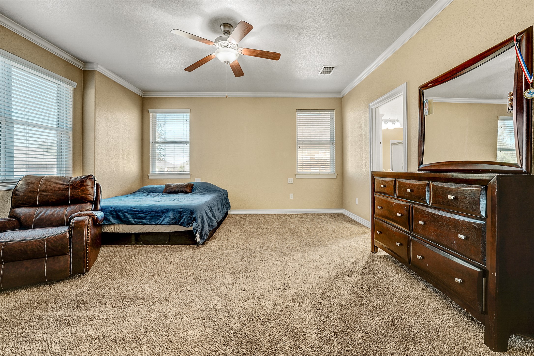 100 Magan Lane Jarrell, TX 76537 - Photo 15 of 31 a living room with furniture a ceiling fan and a window