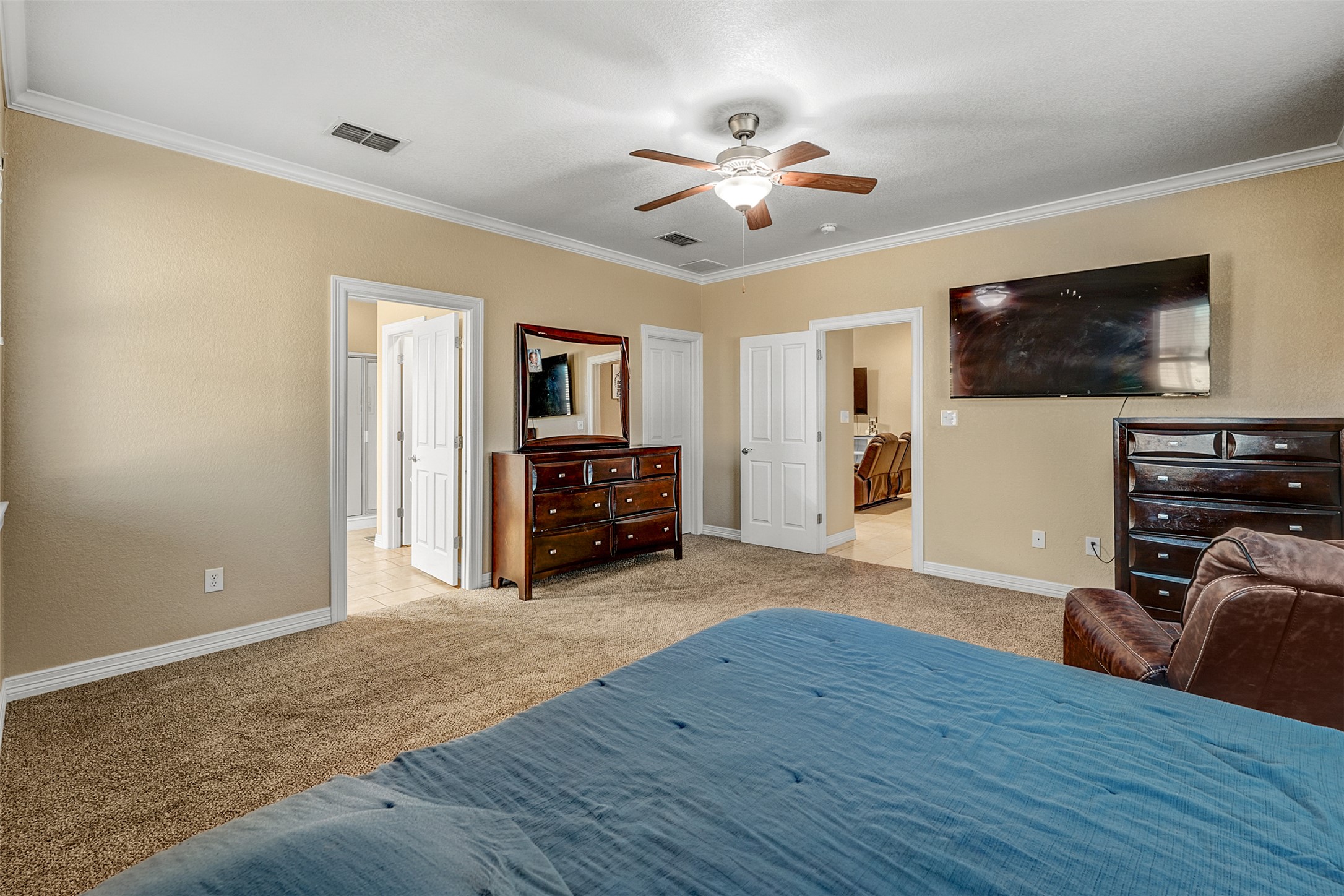 100 Magan Lane Jarrell, TX 76537 - Photo 18 of 32 a living room with furniture and a flat screen tv